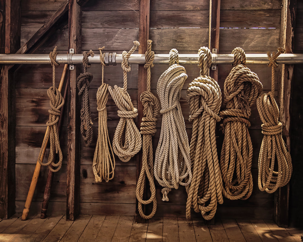 hanging ropes on a wall