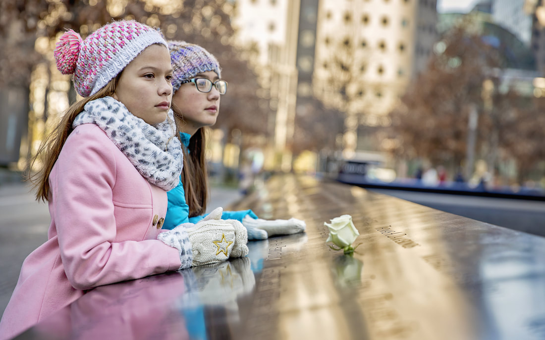 two young girls at the 9/11 memorial