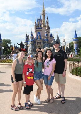 Christine's family of five at Disneyland
