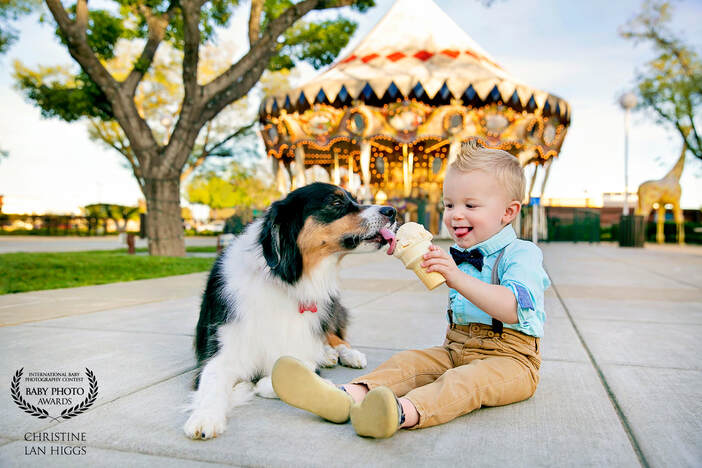 dog licking young boys ice cream
