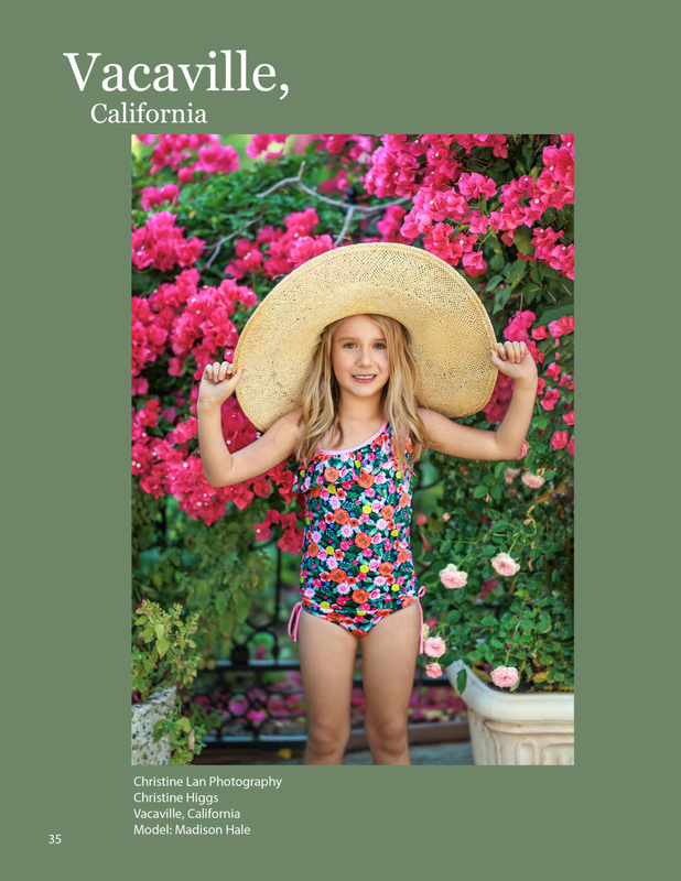 little girl wearing a big hat in a bathing suit