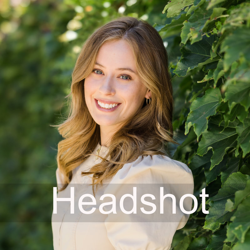 headshot of a girl in a beige top